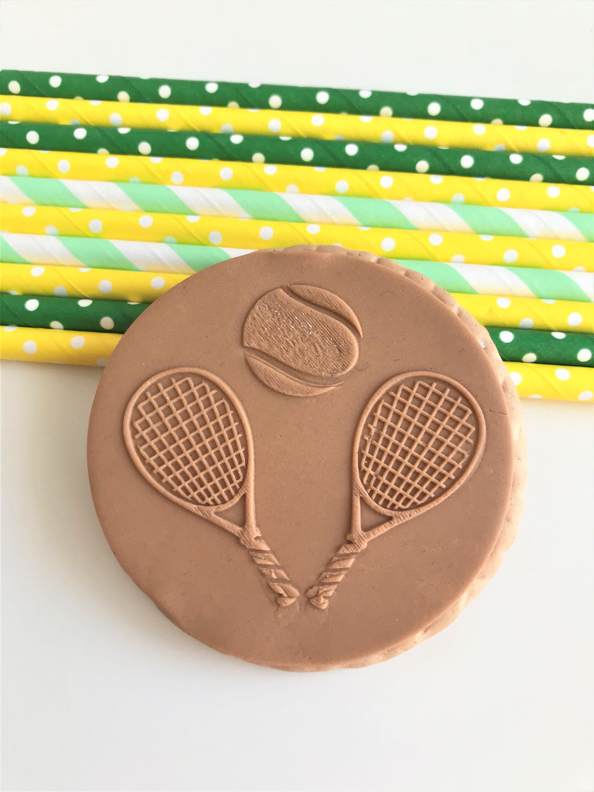 Pair of Tennis Racquets and Tennis Ball Embosser