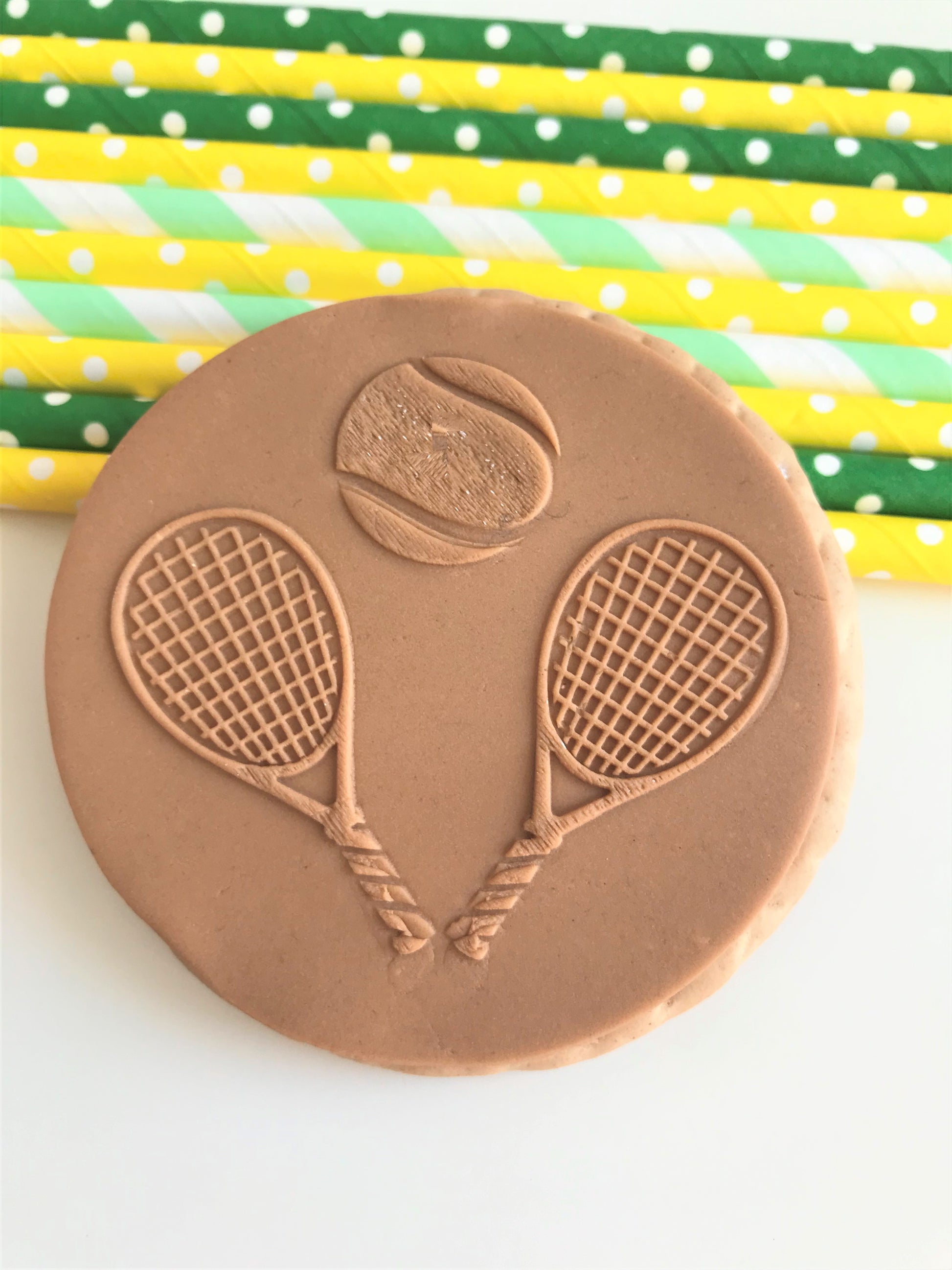 Pair of Tennis Racquets and Tennis Ball Embosser