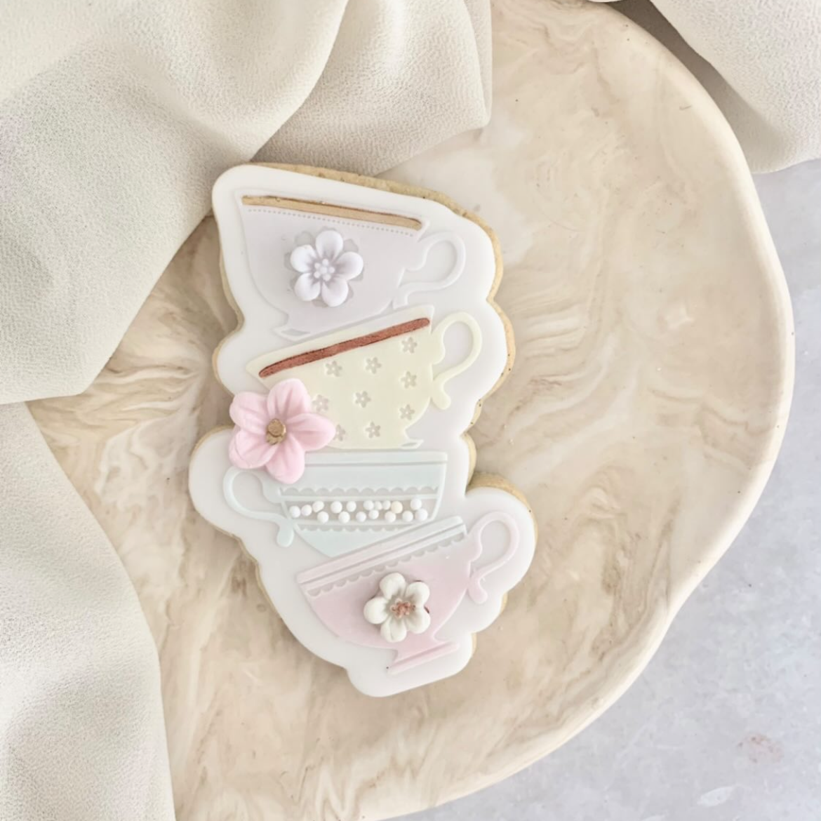 Stack of Teacups Embosser and Cookie Cutter Set.